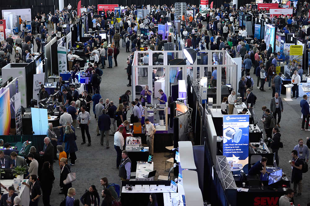 Large crowd of attendees walking the expo floor at last year's Robotics Summit & Expo.